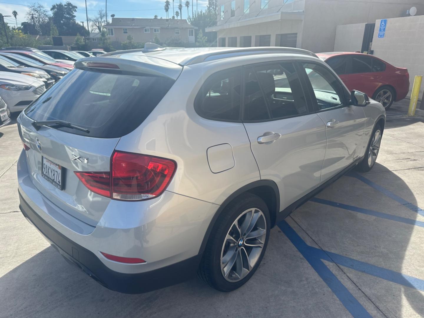 2013 Silver Metallic /Black BMW X1 sDrive28i (WBAVM1C59DV) with an 2.0L L4 DOHC 16V engine, 8-Speed Automatic transmission, located at 30 S. Berkeley Avenue, Pasadena, CA, 91107, (626) 248-7567, 34.145447, -118.109398 - Leather Seats! Premium Wheels! This 2013 BMW X1 sDrive28i looks and drives well. Bad Credit? We can help! We are the bank. All our cars are thoroughly inspected and reconditioned by our technicians. FREE CARFAX report. Stop by or call to speak with our friendly staff. Whether you have bad credit, no - Photo#4